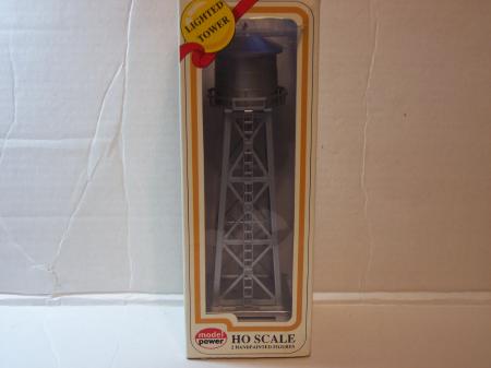MP630 Silver Water Tower Lighted and has two hand painted figure - Click Image to Close